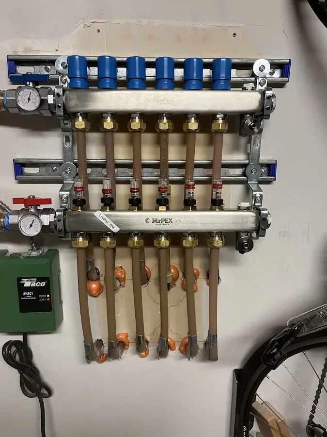 Plumber performing Water Heater Repair at a residential property in Hearne